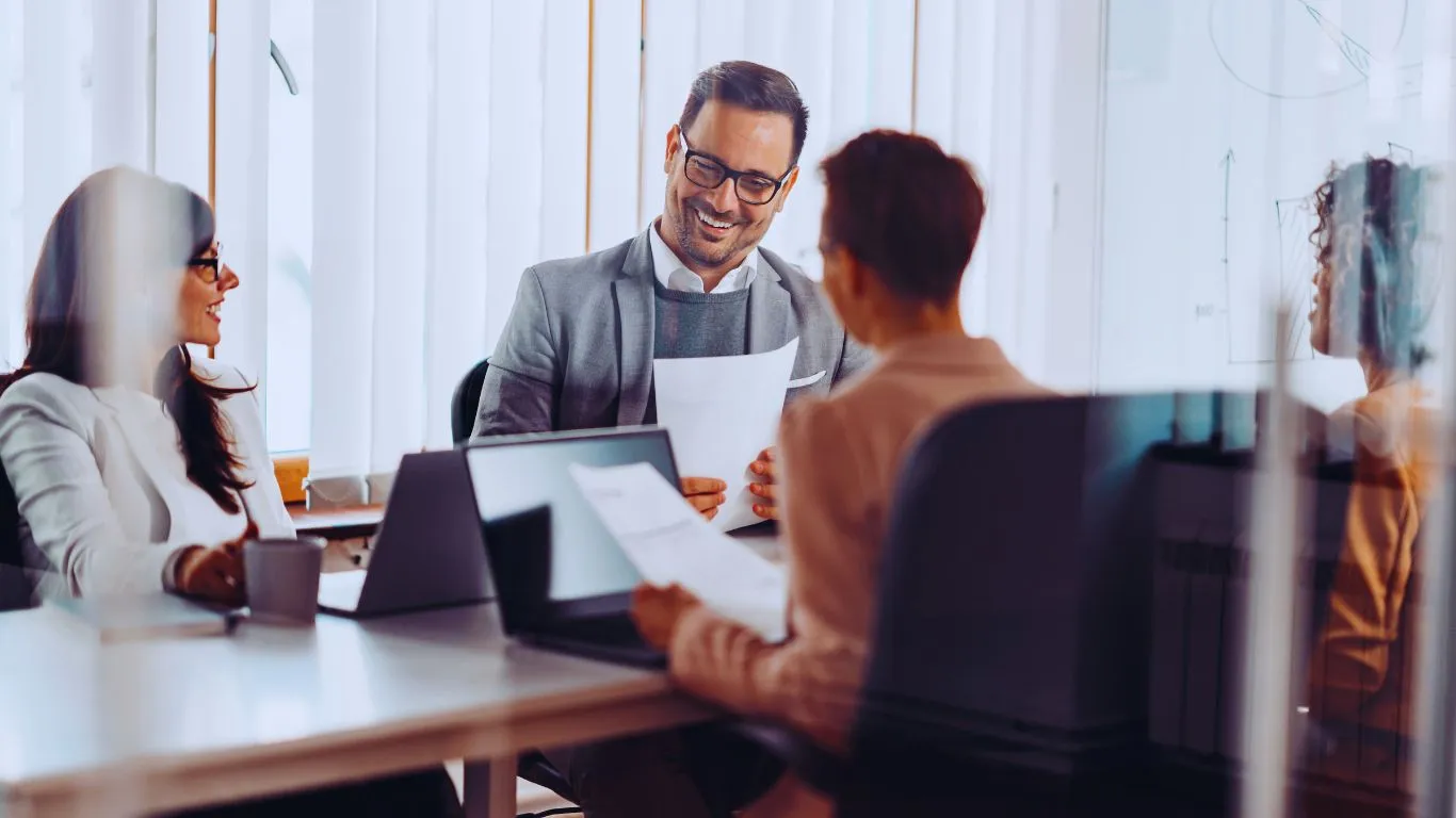 Acevo team collaboration - professionals working together in a modern office environment